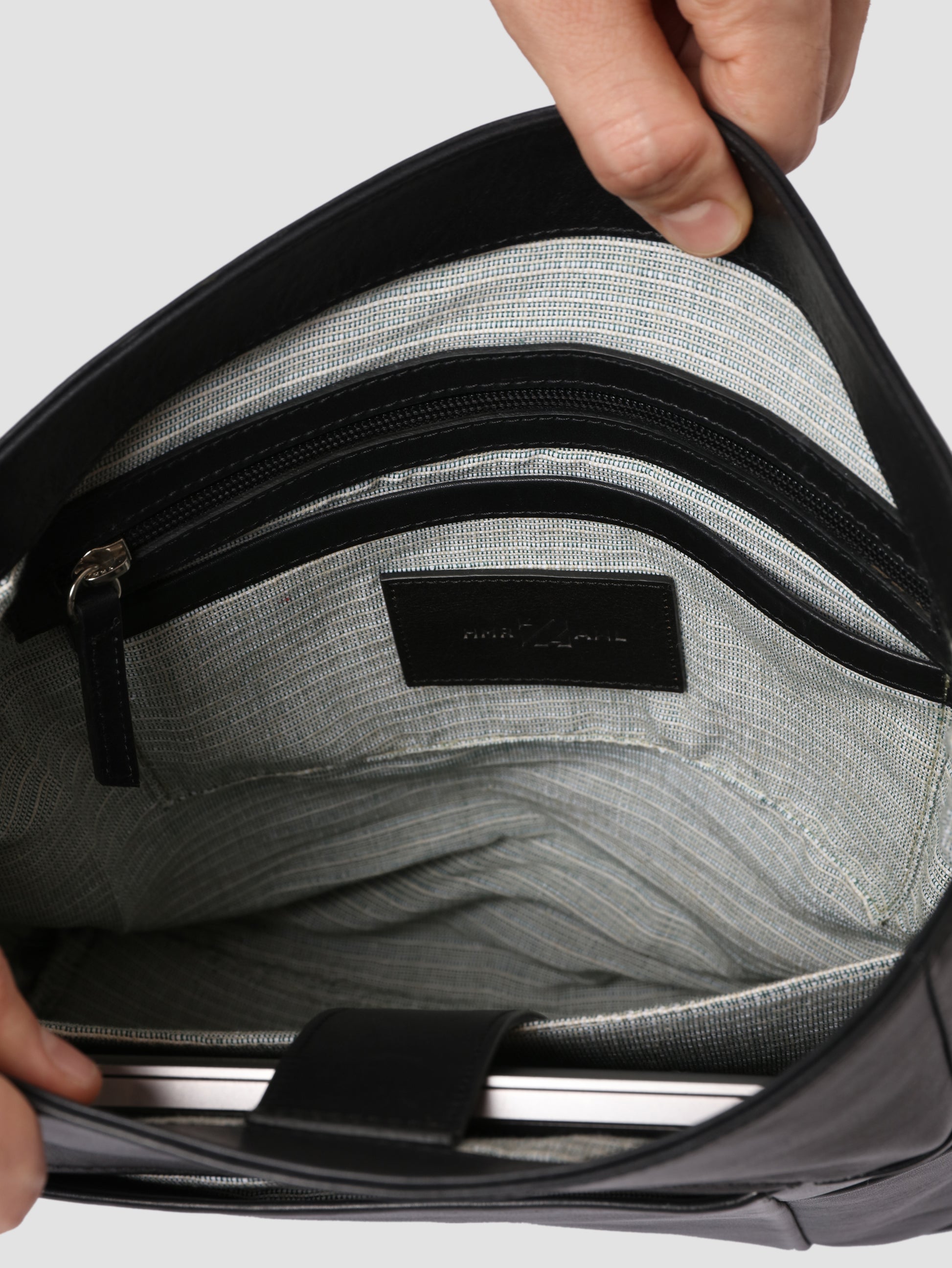 HammerAwl Black Leather Shoulder bag Interior pockets with grey lining and leather trim 