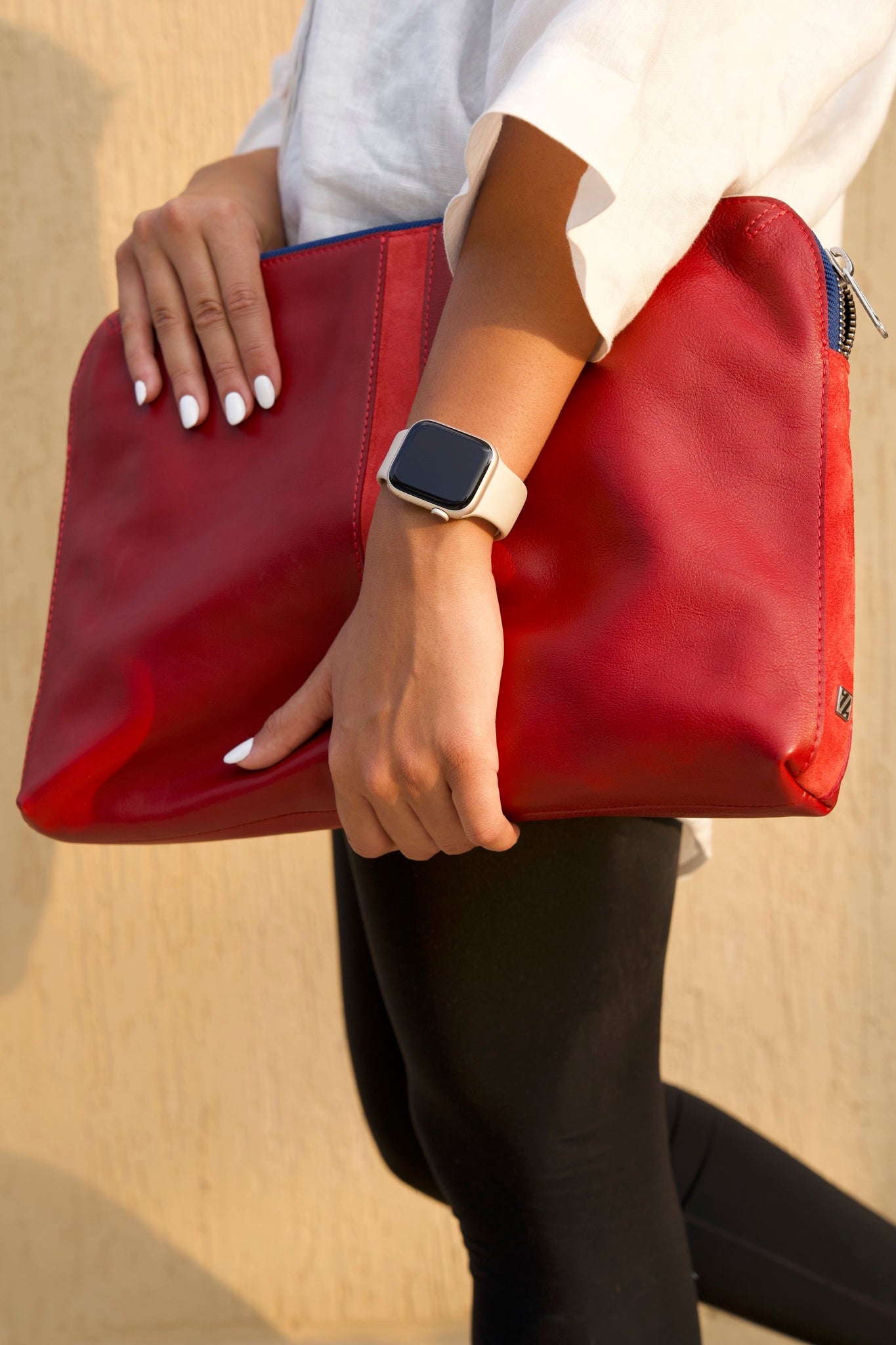 HammerAwl Red Leather Essentials styled by a female model
